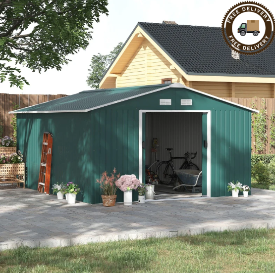 Large green metal shed with tools and open doors.