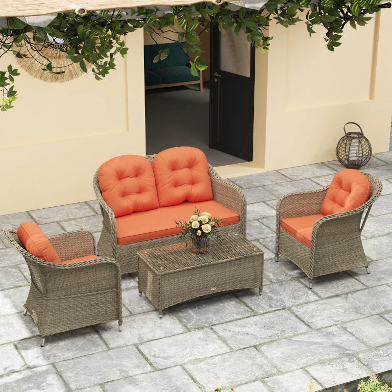 Stylish Four-Piece Rattan Sofa Set with Glass Table