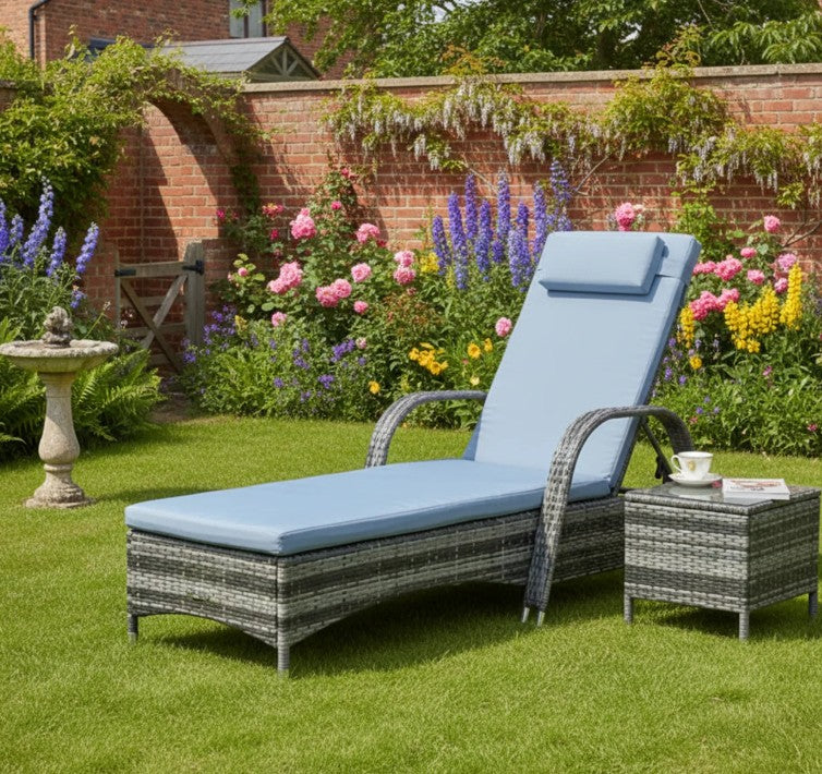 Grey Rattan Sun Lounger with Adjustable Headrest and Blue Cushion