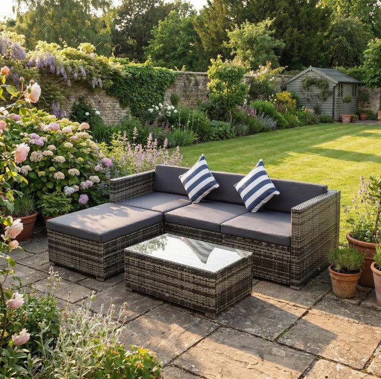 Mixed Brown L-Shaped 3 Seater Sofa With Dark Grey Cushions, Striped Pillows and Glass Top Coffee Table