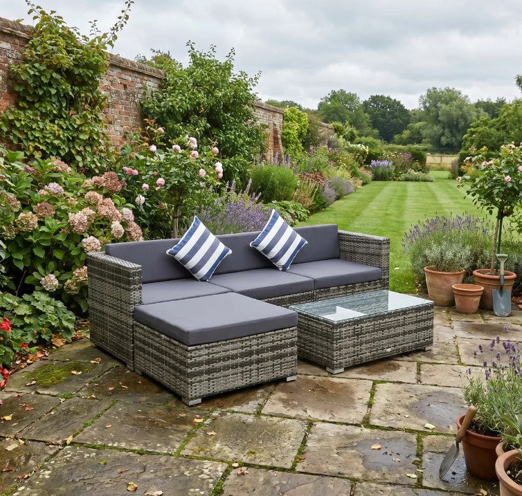 Mixed Brown L-Shaped 3 Seater Sofa With Dark Grey Cushions, Striped Pillows and Glass Top Coffee Table