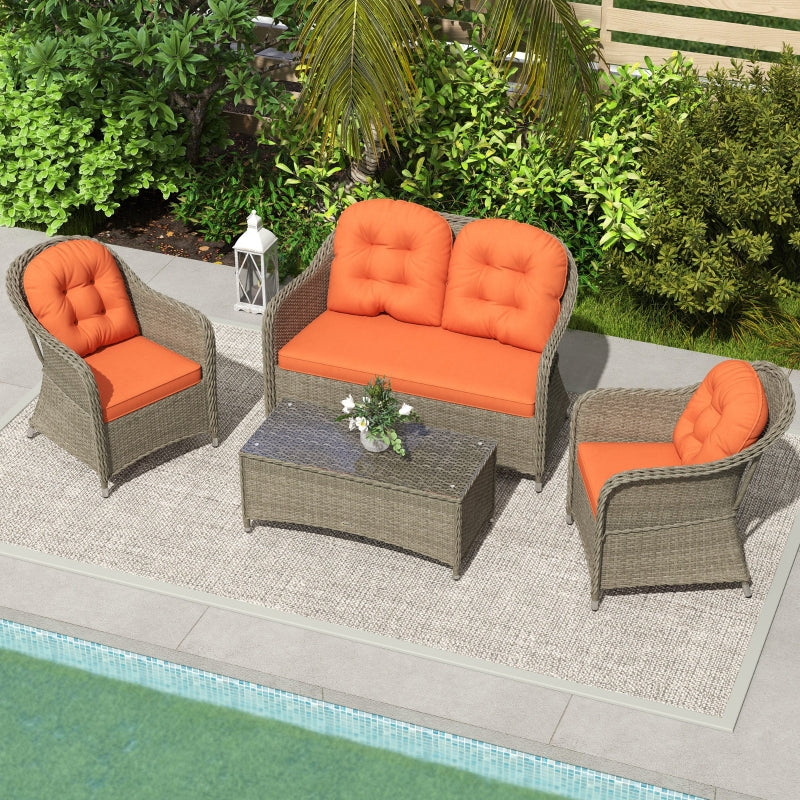 Stylish Four-Piece Rattan Sofa Set with Glass Table