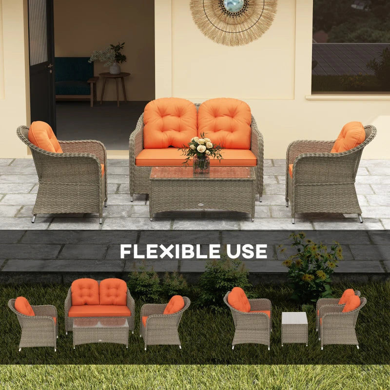 Stylish Four-Piece Rattan Sofa Set with Glass Table