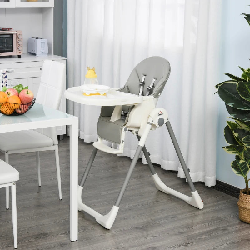 Adjustable Foldable Baby High Chair with Removable Tray and Safety Harness for Infants