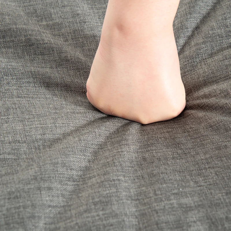 Grey L-Shaped 3 Seater Sofa With Grey Cushions and Glass Top Coffee Table