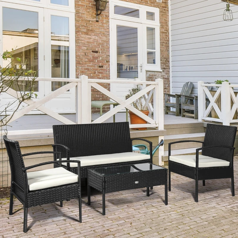 Black 4-Piece PE Rattan Garden Set: Corner Sofa with Cushions, Armchairs, Loveseat & Glass-Top Table