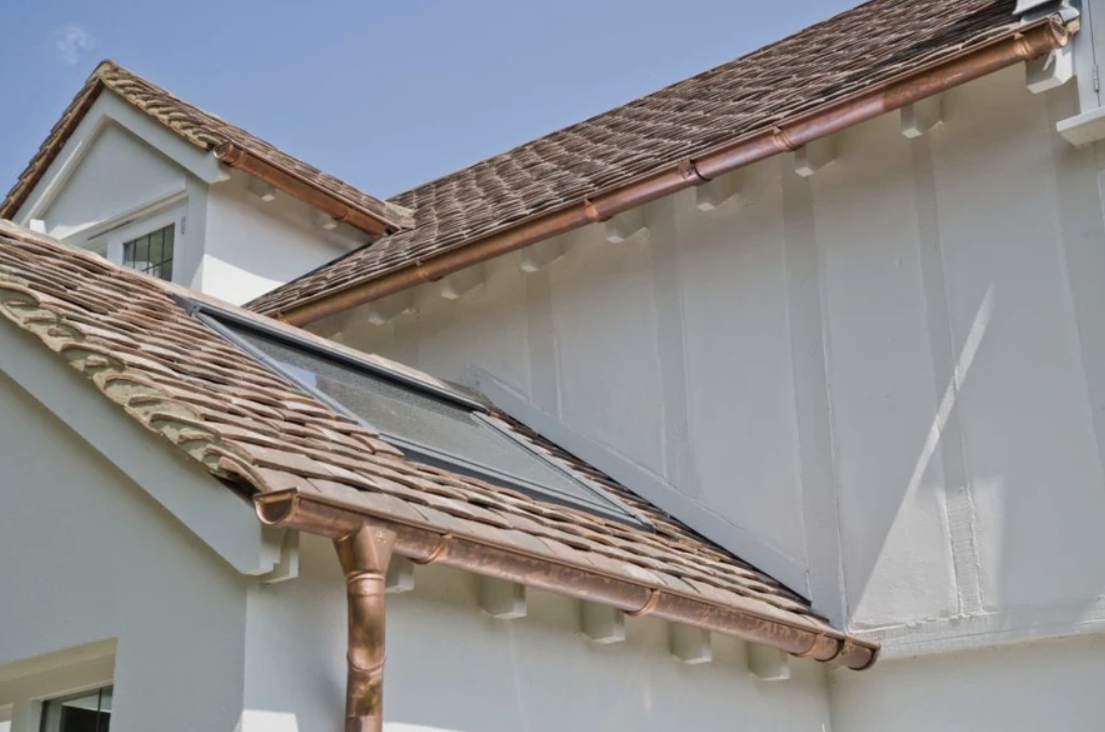 Copper gutters on a slate roof