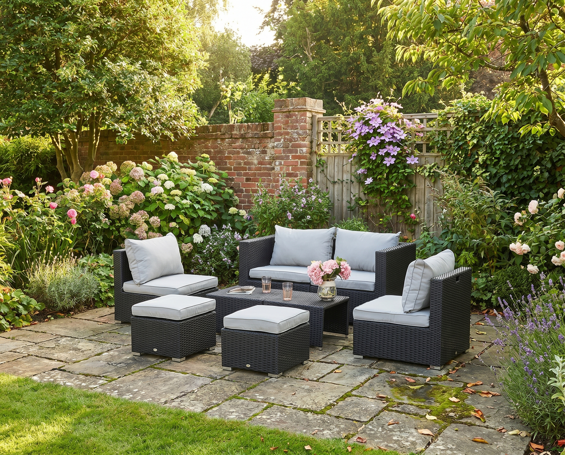 Black Rattan 6 Seater Sofa, 2 Footstools and 2 Coffee Tables